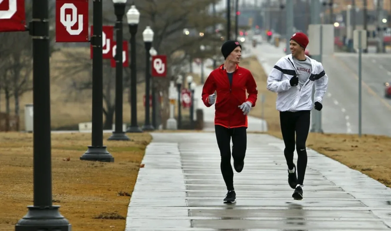Two runners cruising at a true easy pace