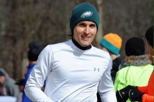Valo running on a chilly morning in a white base layer