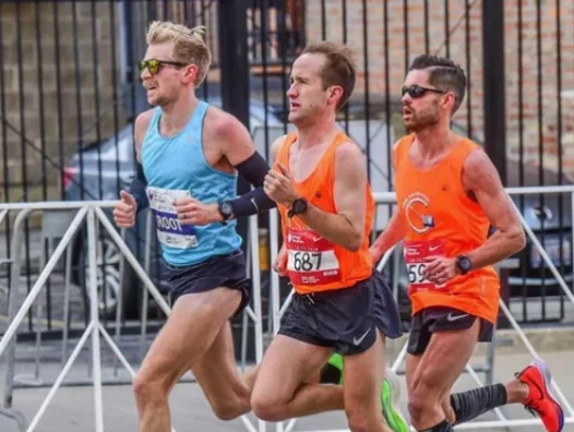 Ryan racing in a tight pack of three runners