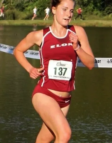 Katie racing cross country for Elon University