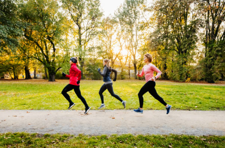 Lauren on a group run in a fall park