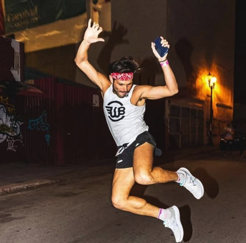 Chris celebrating a triathlon PR