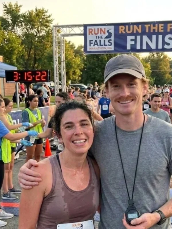 Sarah and Coach Johnny at the Run The Falls Marathon finish line